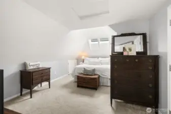 This beautiful and unique owners suite sits at the top of the stairs offering privacy and your own private oasis!