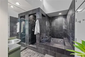 Large primary bathroom with laundry on upper level including slate Japanese soaking tub