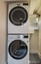 Utility room on the lower level of the Main (South) home was a separate exterior entry and can be used by both homes.