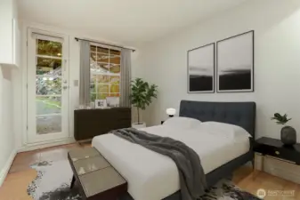 Cottage (North) home lower level bedroom with a separate entrance and alternating tread staircase.  Virtually staged photo.