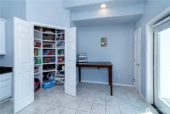 Dining are off kitchen and large walk-in pantry