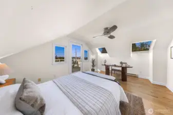Upstairs bedroom which leads to huge deck with views