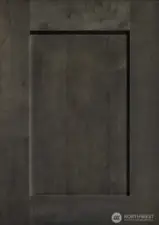 Cabinets throughout the home are Maple shaker style Graphite