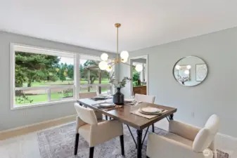 Formal dining room with views of the golf course.