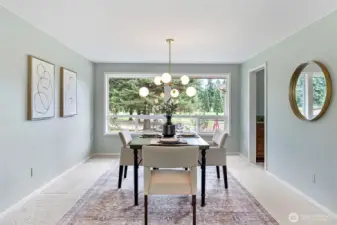 Formal dining room with views of the golf course.