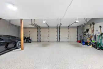 3 car garage with epoxy flooring.