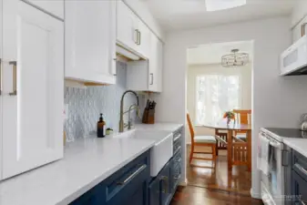 Dishwasher is in hidden in cabinets to the lower left.