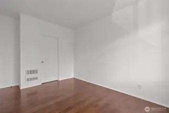 Comfortable primary bedroom with walk-in closet and abundant natural light