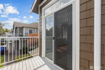 Private deck overlooking community greenery—great for relaxing outdoors