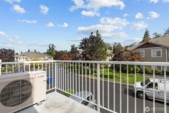 Private deck overlooking community greenery—great for relaxing outdoors