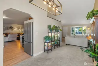 Looking from Dining Room into Kitchen and Living Room