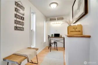 This front room makes for a private, work-from-home space, but could also be a little reading nook, or just where you stash coats, boots, leashes, and backpacks when you get home for the day.