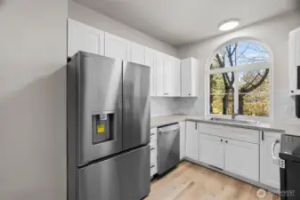 Everything is new, Quartz counters, SS appliances, tile backsplash, lighting & LVP flooring.