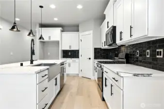 photos of same plan built on a different lot. Details will vary