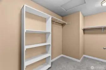 Primary bathroom walk in closet.