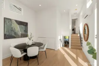 High ceilings, hard wood floors and soaring windows. Fantastic dining space.