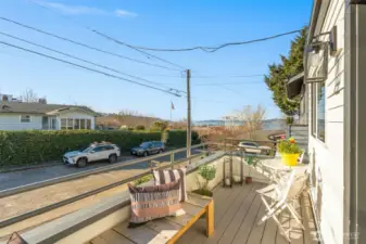 Morning coffee on your kitchen deck?  Views of the port and the sound with sunshine galore.