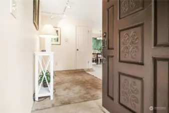 Enter through solid wood door into the spacious living room.