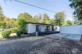 This entire area including the cement slab is your private designated parking space.