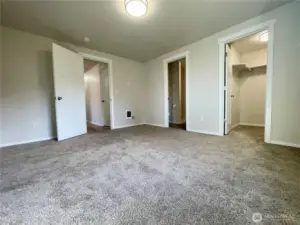 Primary Bedroom with walk-in closet and 3/4 Bath