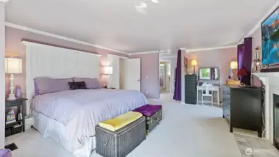 Spacious primary bedroom offering room to relax, refresh, and unwind in comfort