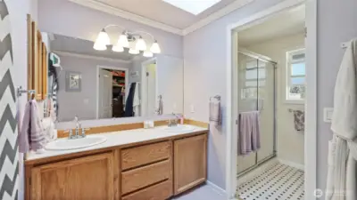 Full en suite bathroom featuring a double vanity-offering both space and comfort in your private retreat