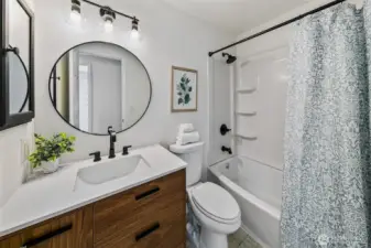 Updated full hall bath.