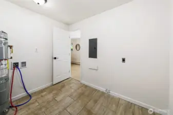 Large laundry room with washer & dryer hookups