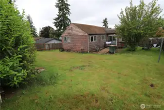 A different perspective of the backyard from across the yard.