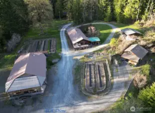 Aerial of upper property buildings and gardens