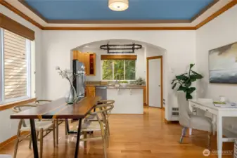 Lovely details like this archway and coved ceiling in the dining room show the craftsmanship with which the home was built.