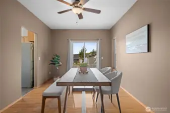 Dining area with sliding doors to access the deck.