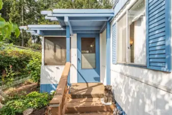 Stairs from sunroom to front yard