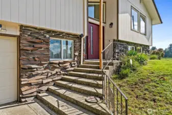Covered front porch welcomes you and your guests.