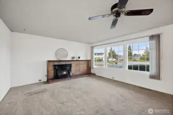 Beautiful Fireplace. Large Windows.