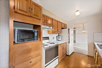 Galley Kitchen with Oak Cabinets