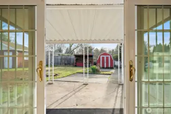 French Doors to the Covered Porch and Large Back Yard.