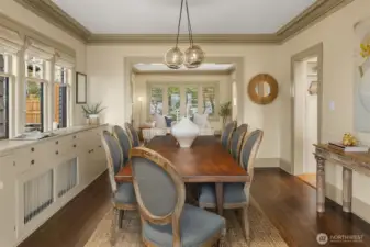 Large formal dining room with built in cabinets.