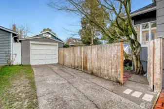 Detached garage with additional off-street parking.