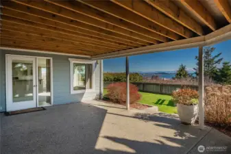 Garden level patio is quite private with a view.