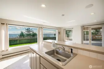 See view from behind the garden level kitchen counter.