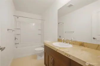 Full bathroom with tub and shower