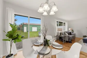 The large sliding door opens to the backyard and provides great natural light in the dining area and living room!