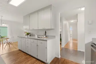 Another outlook from the kitchen showing the hallway towards the bedrooms.