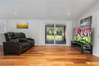 Family room leads to outdoor covered patio