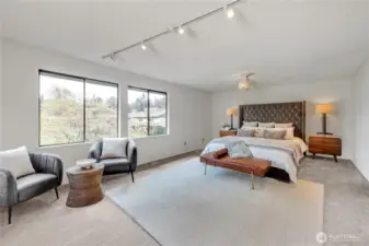 Virtual Staging - This shows off the ample space of this bedroom, not to mention the lovely windows looking out over the rolling emerald fairways