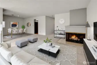 Virtually Staged - you entry from the front entry into the open concept main living area just left of the fireplace