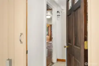 Back door granting access to foyer/laundry area.
