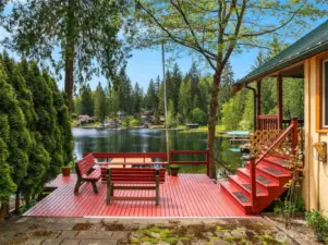 Side deck granting lake views and access to lower and upper levels.