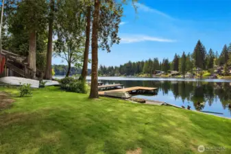 Spacious yard area with easy access to lake and dock.